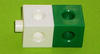 Two adjoining cubes: one white, one green.
