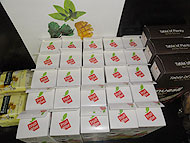 25 juice boxes arranged in a 5 by 5 array.