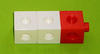 Three adjoining cubes: two white followed by one red.