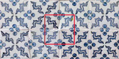 Floor tiles with a red square marking the unit of repeat.