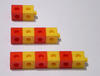 Three groups of cubes alternating in colour between red and yellow. The groups grow by two each time, starting with two cubes.