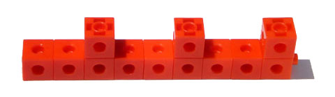 A line of nine red cubes. On top of every third cube is another red cube.